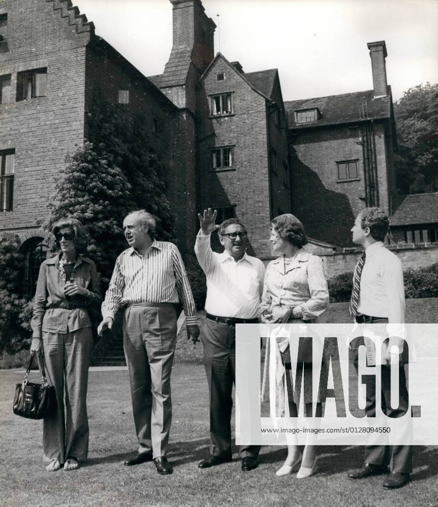 Jun. 06, 1976 - Westerham, England, United Kingdom - US Secretary of State Dr. HENRY KISSINGER, center, who has been on a brief visit to London, this morning went by helicopter to Chartwell, the Westerham, Kent, home of the late Prime Minister Churchill. Dr. Kissinger was accompanied by his second wife, NANCY, left, and 15 year old son, DAVID, right. The Kissinger family, talks with LADY SOAMES (MARY CHURCHILL), second from right, and Sir CHRISTOPHER SOAMES, second from left, on the grounds of Chartwell. Westerham United Kingdom - ZUMAk09_ 19760606_baf_k09_049