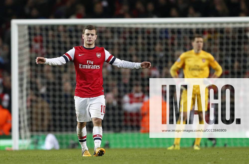Arsenal s Jack Wilshere looks on dejected after going 3-1 down..Arsenal v Bayern Munich - Champions League Second Round, First Leg- Emirates Stadium, London- 19 02 13 - Picture David Klein Sportimage .