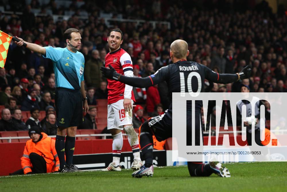 Football - 2012 2013 Champions League - Round of 16, First Leg: Arsenal vs. Bayern Munich Bayern Munich s Arjen Robben jokes with Santi Cazorla of Arsenal at the Emirates Stadium, London