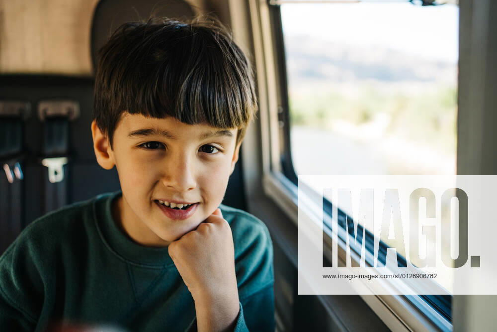 Little boy sitting inside a motorhome while looking at camera, Model released JakeJakab_LikeFatherLikeSon_9.jpg