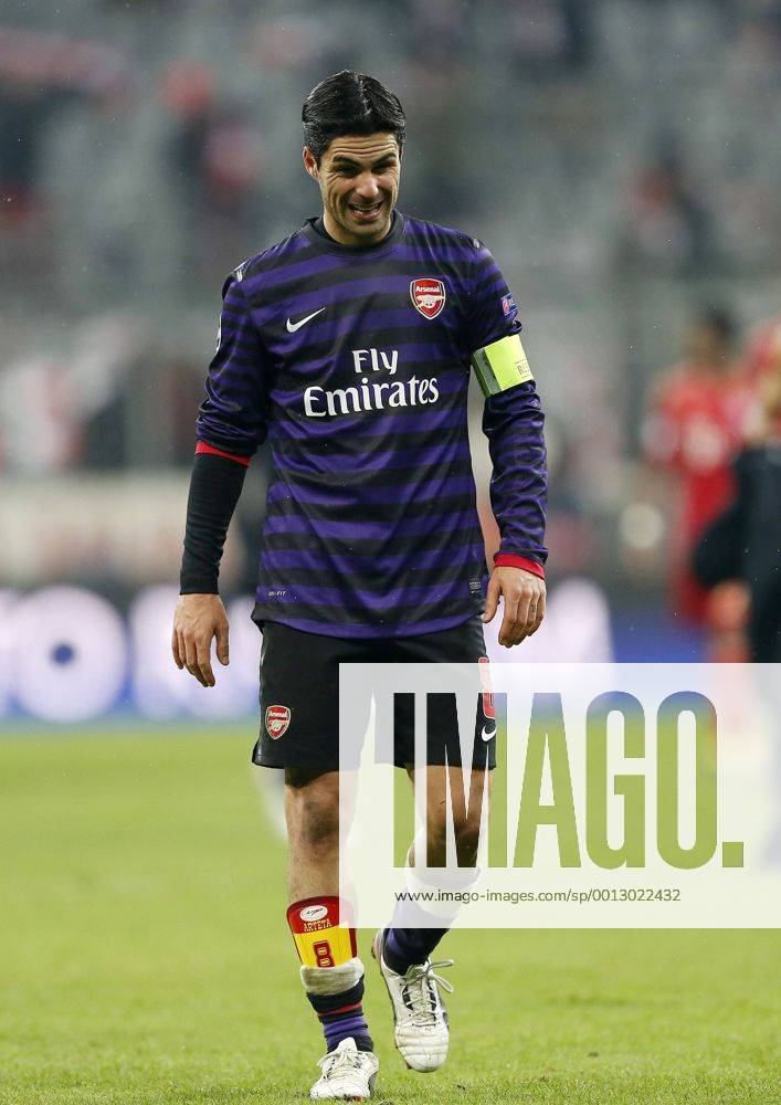 Arsenal s Mikel Arteta looks on dejected at the final whistle..Bayern Munich v Arsenal- UEFA Champions League - Second Round, Second Leg - Allianz Arena, Munich- 13 03 13 - Picture David Klein Sportimage .
