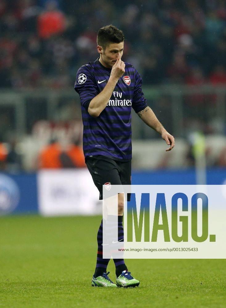 Arsenal s Olivier Giroud looks on dejected..Bayern Munich v Arsenal- UEFA Champions League - Second Round, Second Leg - Allianz Arena, Munich- 13 03 13 - Picture David Klein Sportimage .