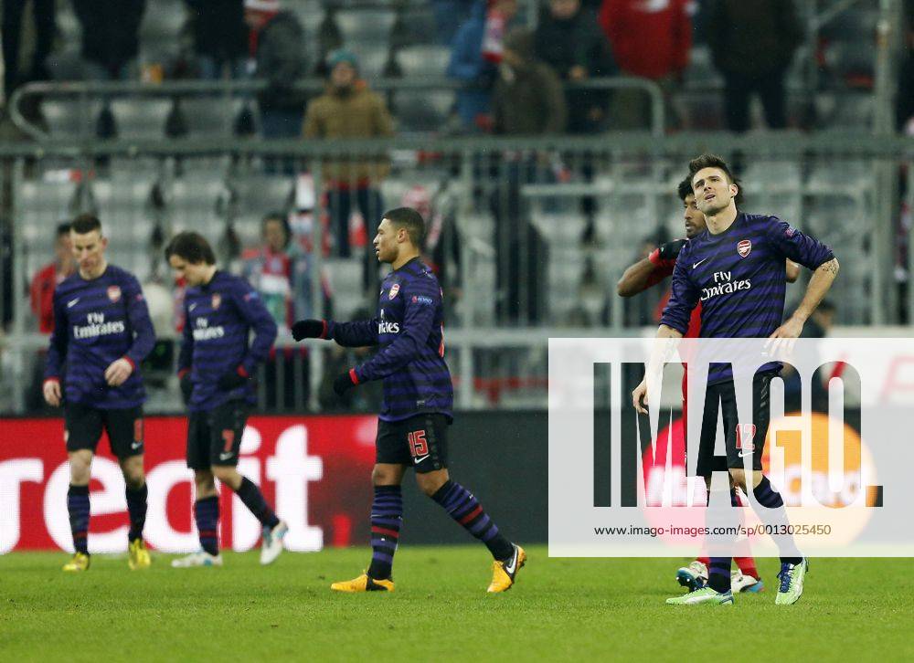 Arsenal s Olivier Giroud looks on dejected at the final whistle..Bayern Munich v Arsenal- UEFA Champions League - Second Round, Second Leg - Allianz Arena, Munich- 13 03 13 - Picture David Klein Sportimage .