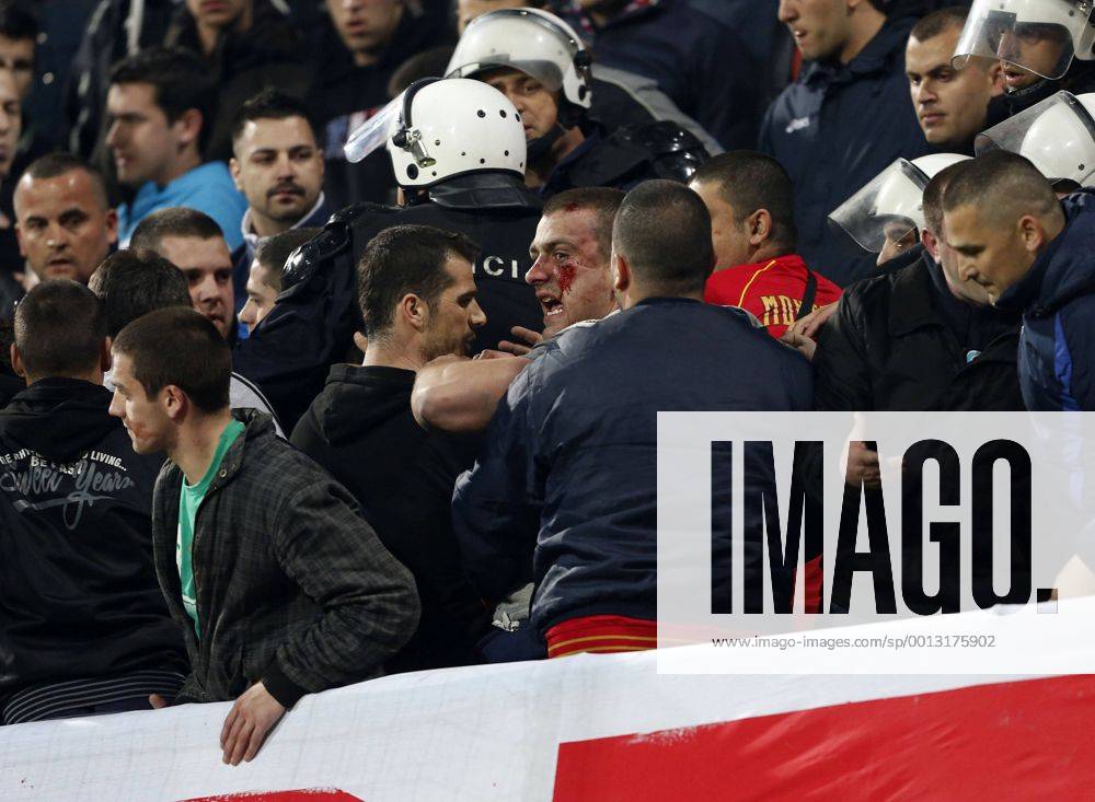 Montenegro s fans fight amongst themselves before kick-off..Montenegro - World Cup Qualifier - Podgorica City Stadium, Podgorica- 26 03 13 - Picture DavidKlein Sportimage .