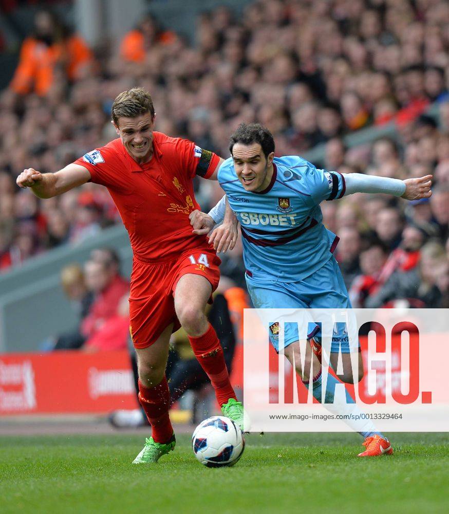 Jordan Henderson of Liverpool tussles with Joey O Brien of West Ham United - Barclays Premier League - Liverpool FC - West Ham United. Anfield Stadium - Liverpool - England - 07 04 13 - .