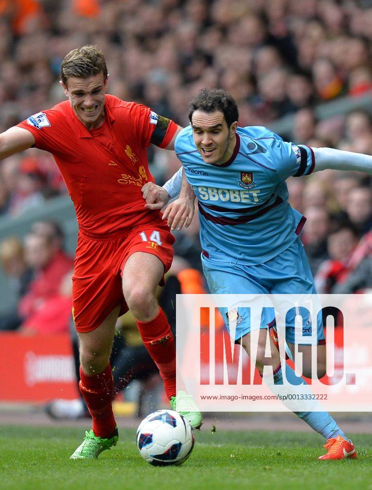 Jordan Henderson of Liverpool tussles with Joey O Brien of West Ham United - Barclays Premier League - Liverpool FC vs West Ham United - Anfield Stadium - Liverpool - England - 07 04 13 - .