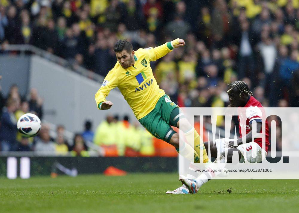 Arsenal s Bacary Sagna fouls Norwich s Bradley Johnson who went off injured.. FC Arsenal London vs Norwich City - Barclays Premier League - Emirates Stadium, London- 12 04 13 - .