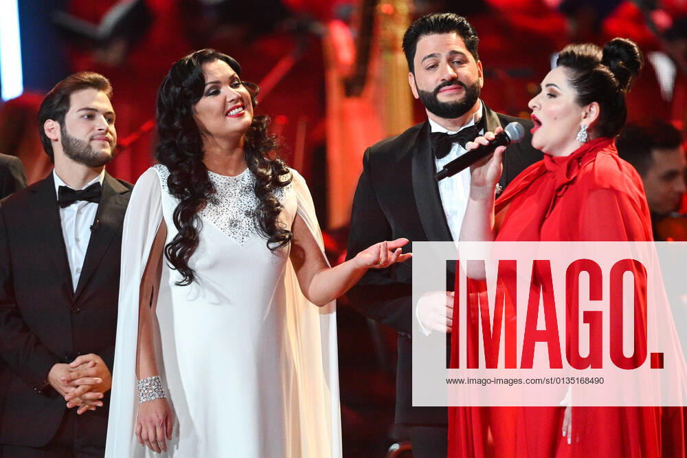 Russia Opera Singer Netrebko Anniversary 6653999 18.09.2021 Opera singer Anna Netrebko, second left, reacts during a concert marking her 50th birthday, at the State Kremlin Palace, Moscow, Russia. Ramil Sitdikov Sputnik Moscow Russia