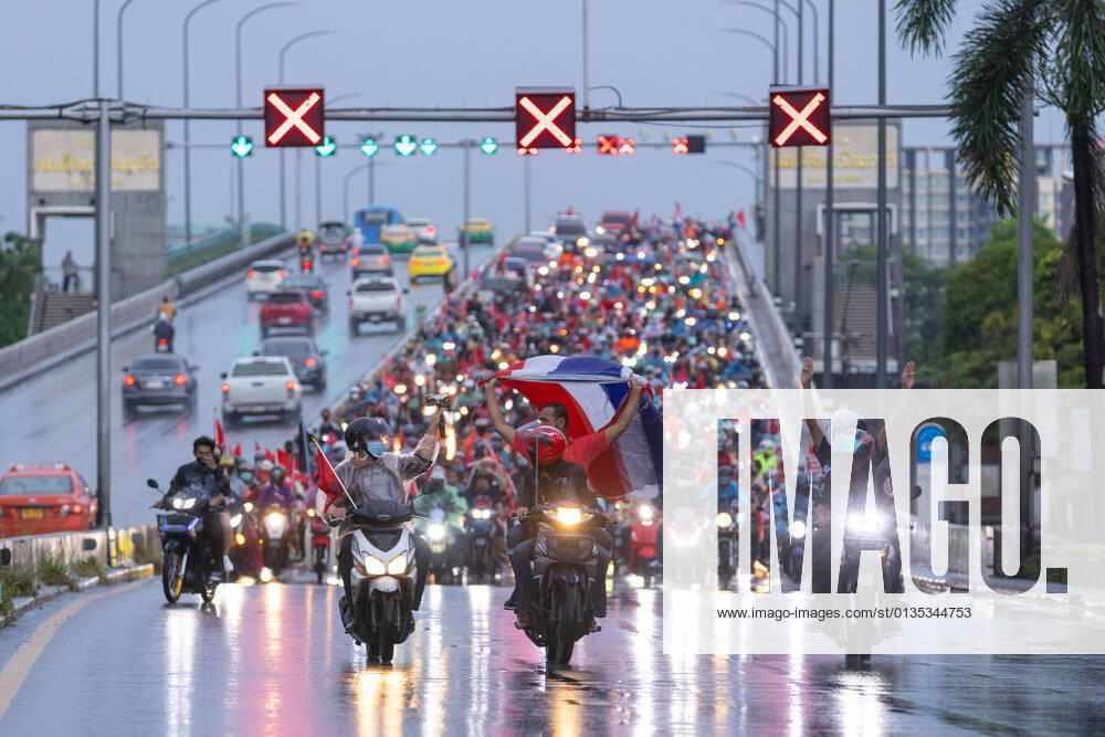 Protesters seen riding motorbikes on the road during the demonstration..Red Shirt Protesters rally a car mob from Asok Intersection to Democracy Monument in demand of resignation of Prayut Chan-O-Cha, prime minister of Thailand. Bangkok Thailand - ZUMAs197 20210919_zaa_s197_276