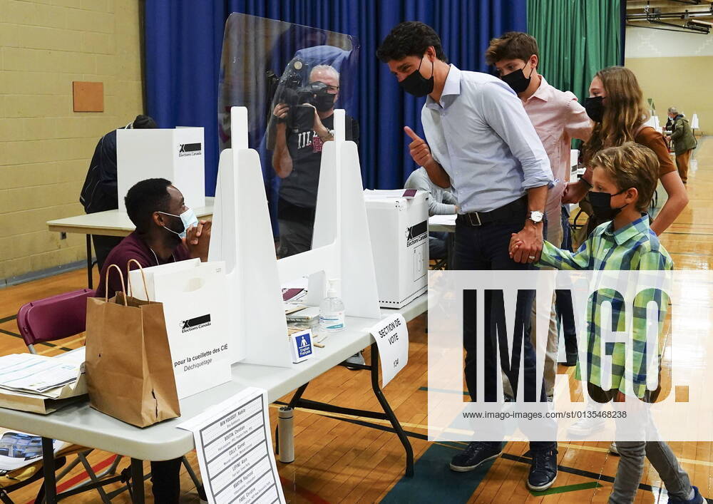 Liberal leader Justin Trudeau votes with the help of his children, clockwise from top, Xavier, Ella-Grace and Hadrien, in his riding of Papineau, Montreal, Quebec on Monday, Sept. 20, 2021. Montreal Canada - ZUMAc35_ 20210920_zaf_c35_034