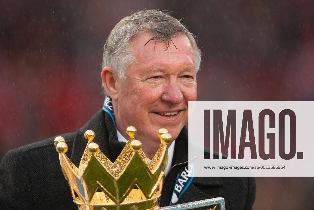 Football - Premier League 2012 2013 - Manchester United ae Alex Ferguson, manager of Manchester United celebrates with the trophy at Old Trafford