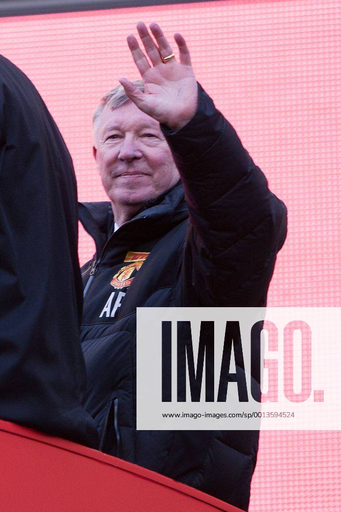 Alex Ferguson, manager of Manchester United waves from the back of the bus - Manchester United - Premier League Trophy Parade - Manchester - England -13 05 2013 - .