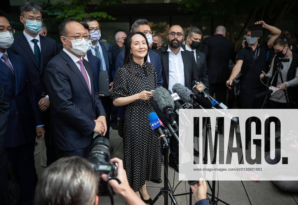 Meng Wanzhou, chief financial officer of Huawei, reads a statement outside B.C. Supreme Court, in Vancouver, B.C., Friday, Sept. 24, 2021. Vancouver Canada - ZUMAc35_ 20210924_zaf_c35_130