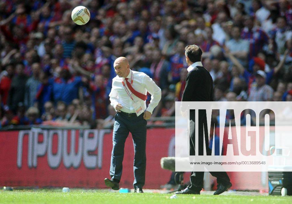 Football : Championship play-off final Crystal Palace v Watford Wembley Ian Holloway - Palace Manager heads the ball back into play As Gianfranco Zola watches