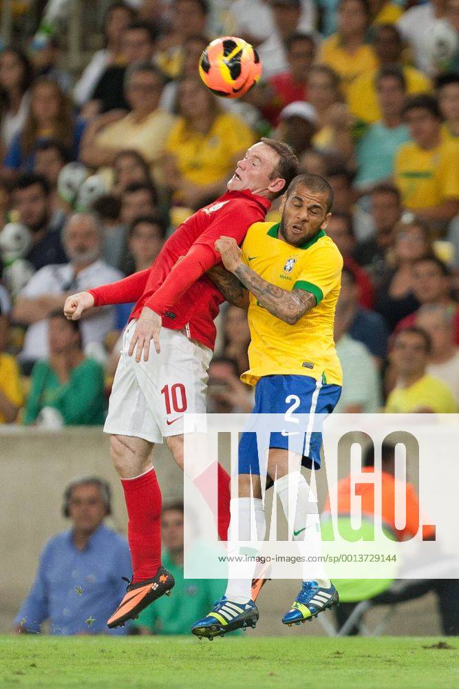Football - International Friendly - Brazil vs. England Wayne Rooney of England and Daniel Alves da Silva of Brazil at the Maracana Stadium, Rio de Janeiro