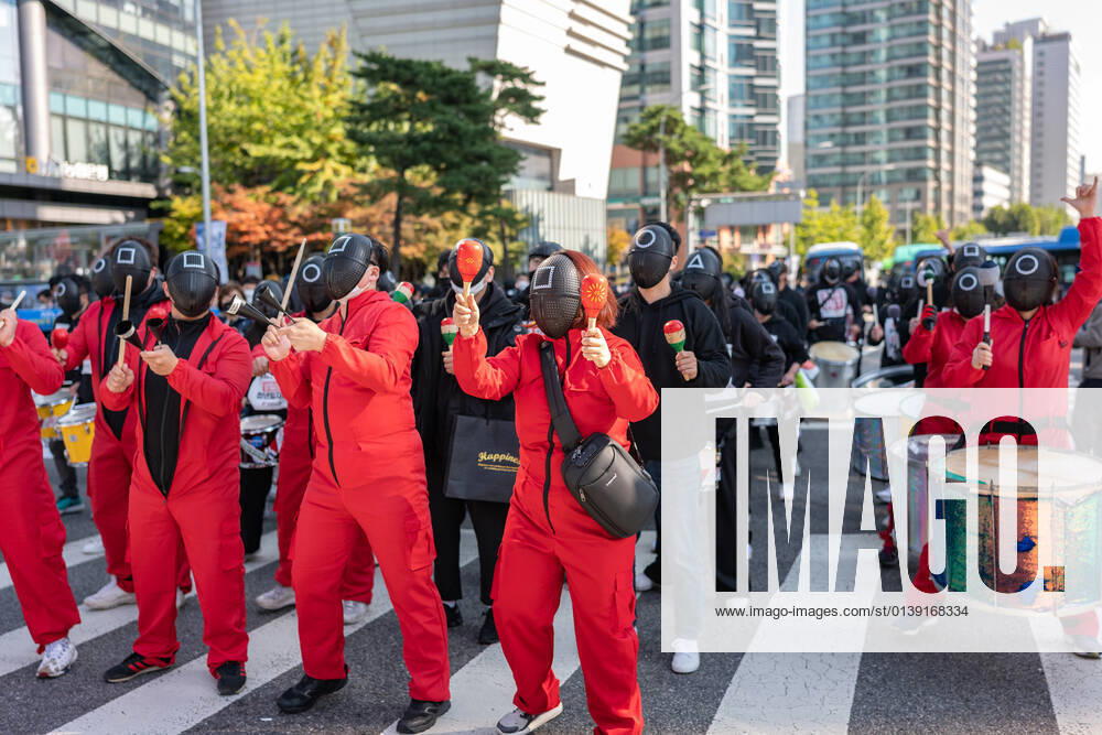 General Strike Of The Korean Confederation Of Trade Unions In Seoul Members of the Korean Confederation of Trade Unions wear masks costumed in the Netflix series Squid Game for a march to Seoul City hall during a rally against the government s labor policy on October 20, 2021 in Seoul, South Korea. Thousands of union members hold a massive rally in Seoul as an one-day strike aimed at bringing labor issues to the next presidential election in 2022. Seoul South Korea