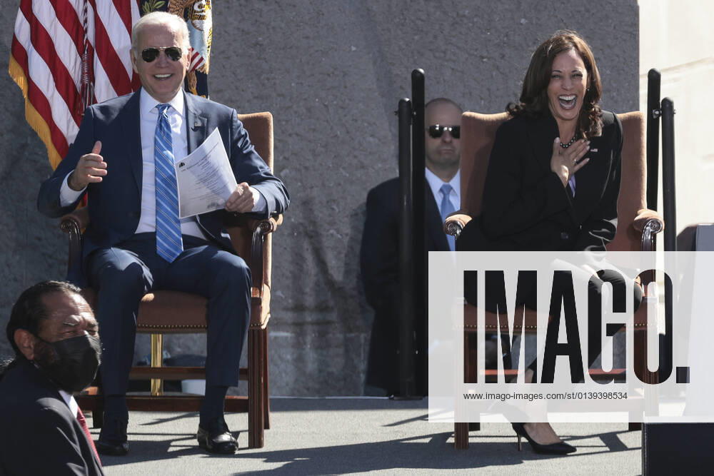 President Joe Biden and Vice President Kamala Harris reacts during a light moment at a ceremony marking the 10th Anniversary of the dedication of the Martin Luther King, Jr. Memorial near the Tidal Basin on the National Mall on Thursday, October 21, 2021 in Washington, DC. WASP20211021110 OliverxContreras