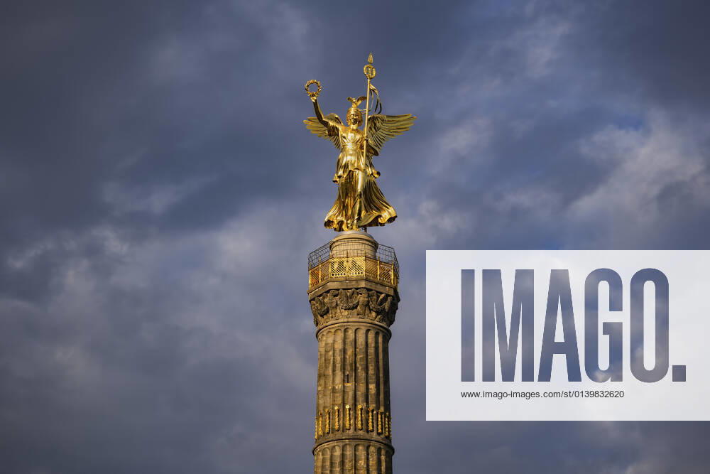 Germany, Berlin, Victory Column standing against cloudy sky ABOF00748