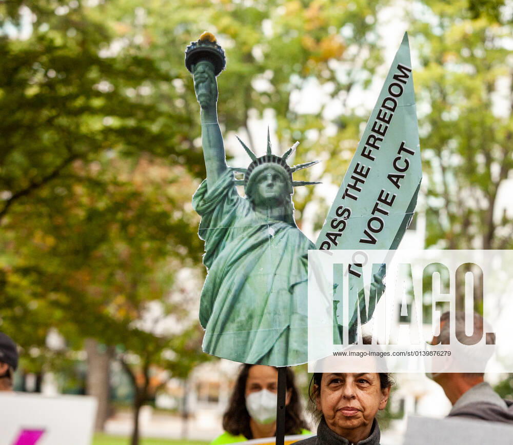 3-day relay for voting rights ends with rally at US Capitol A protester holds a Statue of Liberty sign during a rally at the end of a relay for voting rights at the US Capitol. Protesters began the relay in West Virginia and walked or biked for the 3 days to the US Capitol. Protesters are demanding that Congress pass legislation protecting the right to vote for all Americans. Washington District of Columbia United States