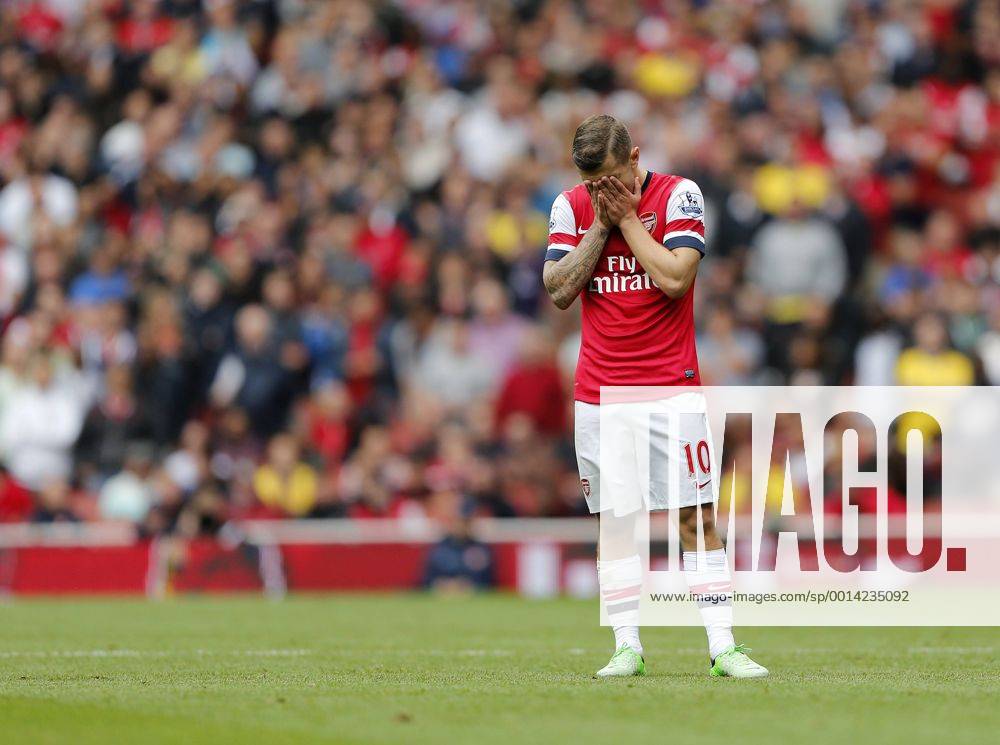 Arsenal s Jack Wilshere looks on dejected after getting booked - FC Arsenal London v Aston Villa FC - Barclays Premiership - Emirates Stadium - London - England -17 08 2013 - .