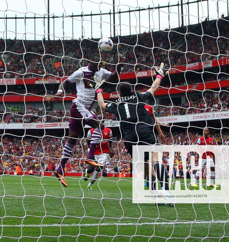 Arsenal FC London v Aston Villa . . London, UK . . 17.08.2013 Christian Benteke (AV) has his penalty kick saved by Wojciech Szczesny(A) but scored the goal on the rebound. 1-1