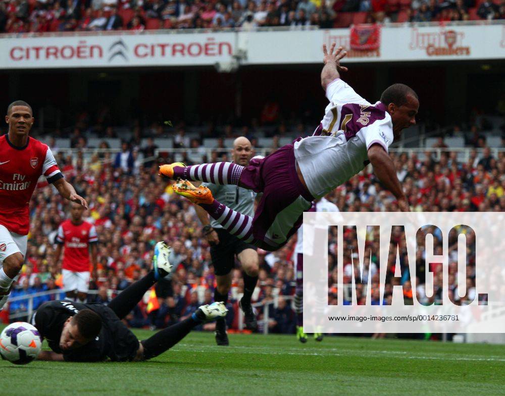 Arsenal FC London v Aston Villa . . London, UK . . 17.08.2013 Gabriel Agbonlahor (AV) is pulled down by Wojciech Szczesny(A) to give away a penalty.