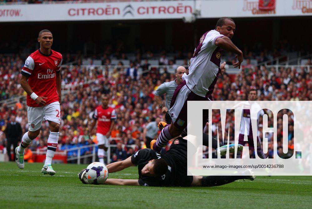 Arsenal FC London v Aston Villa . . London, UK . . 17.08.2013 Gabriel Agbonlahor (AV) is pulled down by Wojciech Szczesny(A) to give away a penalty.