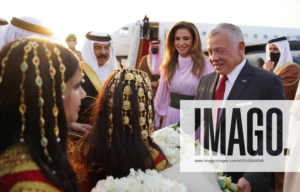 Jordan King Abdullah II and Queen Rania are received by Bahrain King Hamad bin Isa Al Khalifa and Crown Prince Salman bin Hamad Al Khalifa, who is also prime minister of Bahrain, upon arrival at Sakhir Air Base.