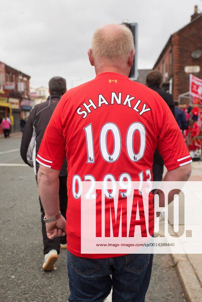 A fan wears a replica shirt commemorating Bill Shankly - FC Liverpool - Barclay s Premier League - Anfield - Liverpool - 01 09 2013 .