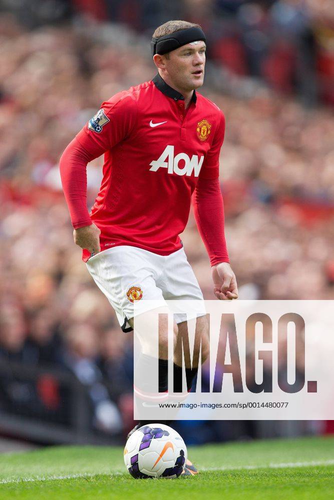 Wayne Rooney of Manchester United (ManU) wearing a protective headband - Manchester United (ManU) vs. Crystal Palace - Premier League - Old Trafford - Manchester - 14 09 2013 Pic Philip Oldham Sportimage .