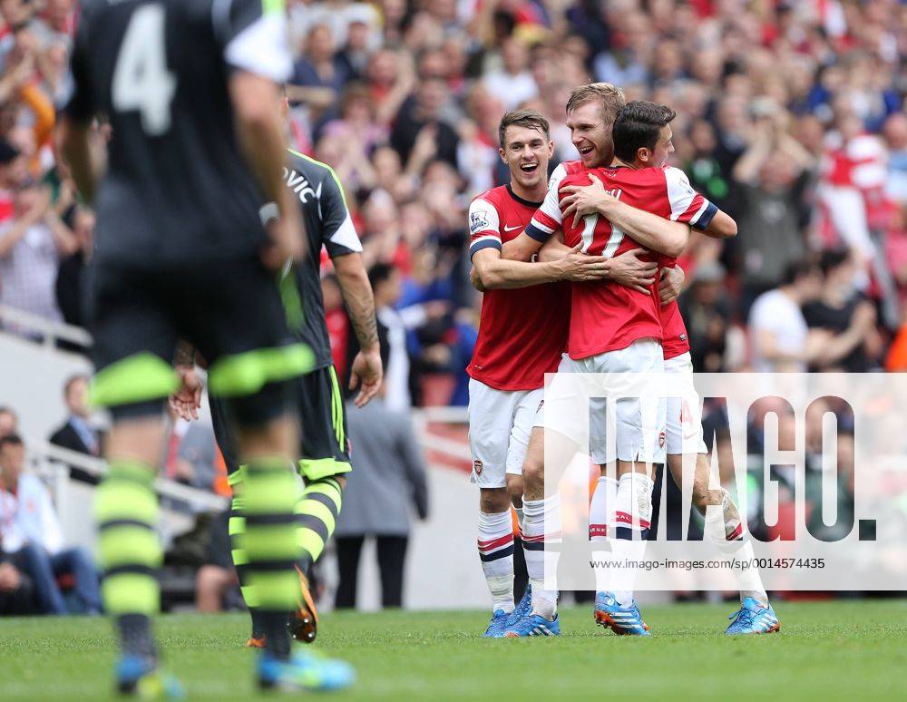 Arsenal s Per Mertesacker celebrates scoring his sides second goal Arsenal v Stoke - Barclays Premier League- Emirates Stadium - London - England -22 09 2013 - .