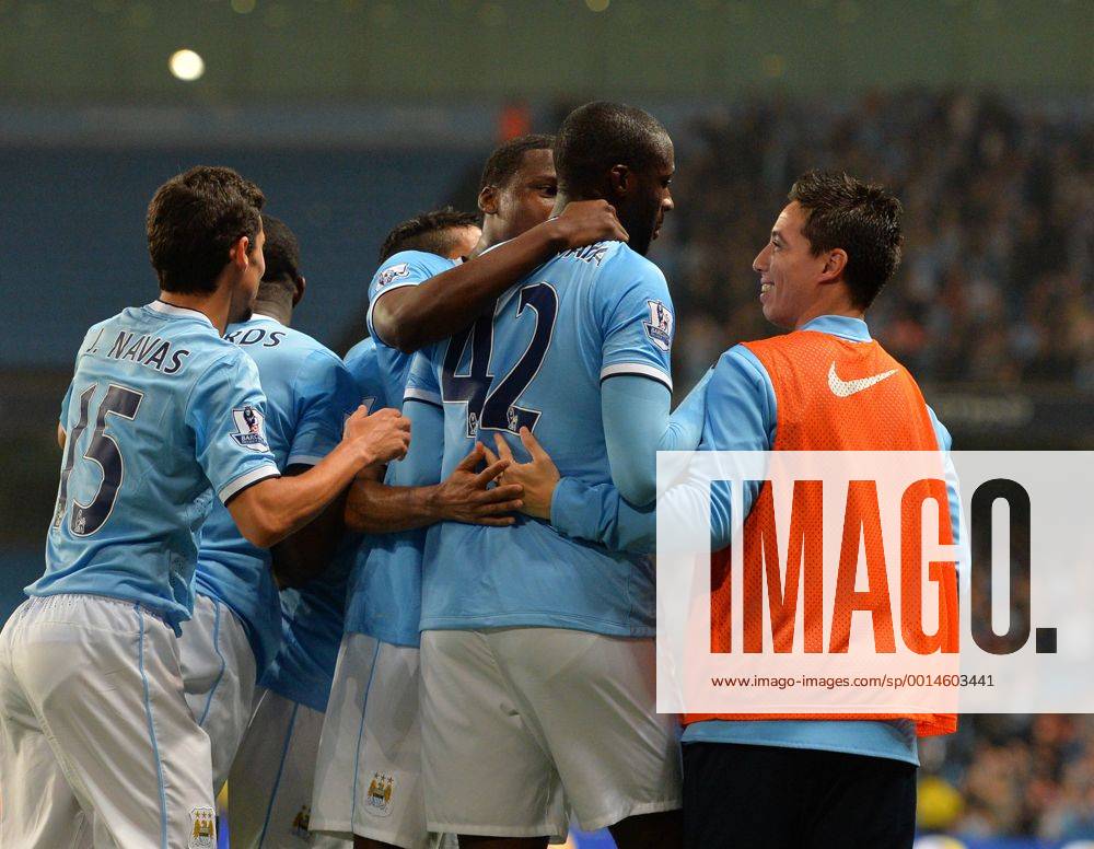 Yaya Toure of Manchester City celebrates his goal with sub Samir Nasri of Manchester City - Capital One Cup - Third Round - Manchester City vs Wigan Athletic - Etihad Stadium - Manchester - 24 09 13 - Picture Simon Bellis Sportimage .