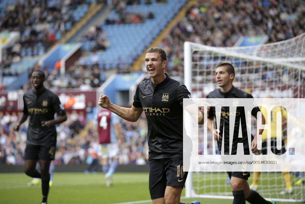 Edin Dzeko celebrates scoring to give Manchester City the lead at 2-1 - Football - Barclays Premier League - Aston Villa vs Manchester City - Villa Park Birmingham - Season 2013-2014 - September 28th 2013 - Photograph Malcolm Couzens Sportimage .