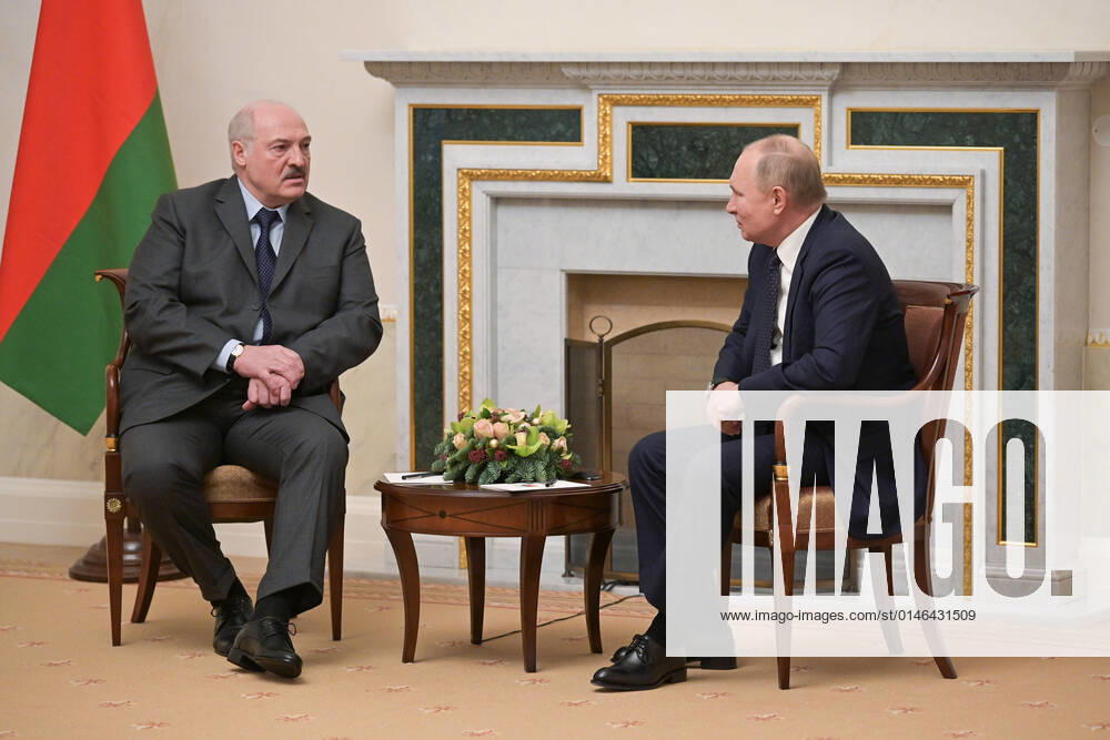 ST PETERSBURG, RUSSIA – DECEMBER 29, 2021: Belarus President Alexander Lukashenko (L) and Russia s President Vladimir Putin meet for talks at the Konstantinovsky Palace. Alexei Nikolsky Russian Presidential Press and Information Office TASS TS11DAF8