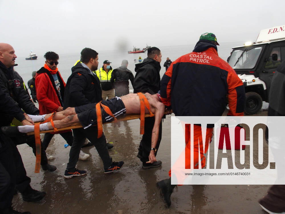 January 1, 2022 New York , Coney Island Polar Bear Plunge. This year the Polar Bear Plunge returned after last year s Covid outbreak. Revelers enjoy the water..Participant prior to massive cardiac event and Emergency medical personnel try and revive him before transporting him to area hospital. New York USA - ZUMAct2_ 20220101_zaf_ct2_095