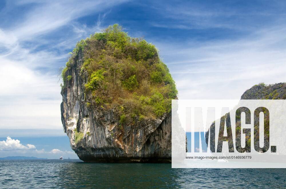Ko Phi Phi consists of two islands, Phi Phi Leh and Phi Phi Don, located southeast of Phuket. Both are part of Hat Noppharat Thara Ko Phi Phi National Marine Park.<br ><br > Set in the centre of the Sea of Phuket, Ko Phi Phi is almost equidistant from Phuket and Krabi and can be reached by boat in around two hours.<br ><br > Phi Phi Don is the larger of the two islands, with scenic hills, steep cliffs, silken beaches, azure waters and remarkable bird- and sea-life. The island narrows at the middle where long, white-sand beaches are only a few hundred metres apart. Boats from Krabi and Phuket dock at Ao Ton Sai on the southern side of the island. Hat Yao or Long Beach faces south and is famous for the good snorkelling to be had on its co CPAxMediaxCo.xLtd. 1060_14_CPA0011095