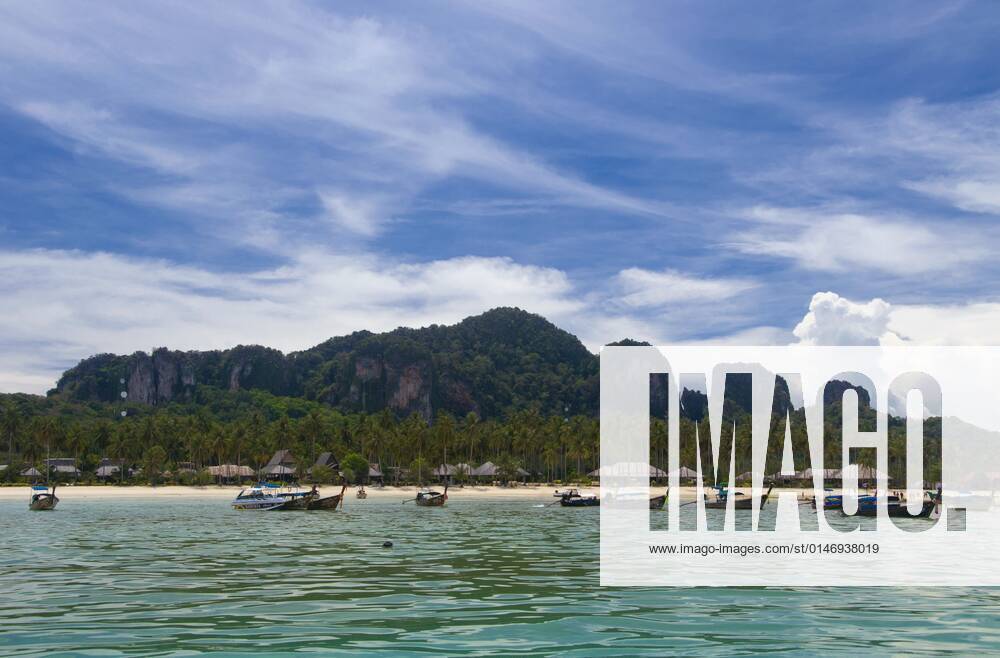 Ko Phi Phi consists of two islands, Phi Phi Leh and Phi Phi Don, located southeast of Phuket. Both are part of Hat Noppharat Thara Ko Phi Phi National Marine Park.<br ><br > Set in the centre of the Sea of Phuket, Ko Phi Phi is almost equidistant from Phuket and Krabi and can be reached by boat in around two hours.<br ><br > Phi Phi Don is the larger of the two islands, with scenic hills, steep cliffs, silken beaches, azure waters and remarkable bird- and sea-life. The island narrows at the middle where long, white-sand beaches are only a few hundred metres apart. Boats from Krabi and Phuket dock at Ao Ton Sai on the southern side of the island. Hat Yao or Long Beach faces south and is famous for the good snorkelling to be had on its co CPAxMediaxCo.xLtd. 1060_14_CPA0013657