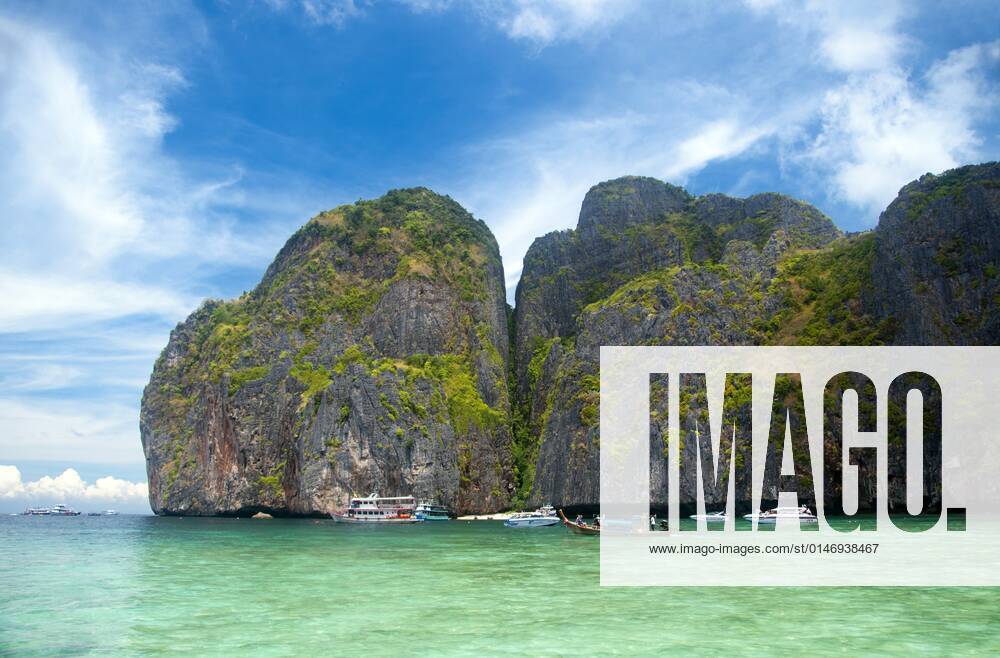 Ko Phi Phi consists of two islands, Phi Phi Leh and Phi Phi Don, located southeast of Phuket. Both are part of Hat Noppharat Thara Ko Phi Phi National Marine Park.<br ><br > Set in the centre of the Sea of Phuket, Ko Phi Phi is almost equidistant from Phuket and Krabi and can be reached by boat in around two hours.<br ><br > Phi Phi Don is the larger of the two islands, with scenic hills, steep cliffs, silken beaches, azure waters and remarkable bird- and sea-life. The island narrows at the middle where long, white-sand beaches are only a few hundred metres apart. Boats from Krabi and Phuket dock at Ao Ton Sai on the southern side of the island. Hat Yao or Long Beach faces south and is famous for the good snorkelling to be had on its co CPAxMediaxCo.xLtd. 1060_14_CPA0014909