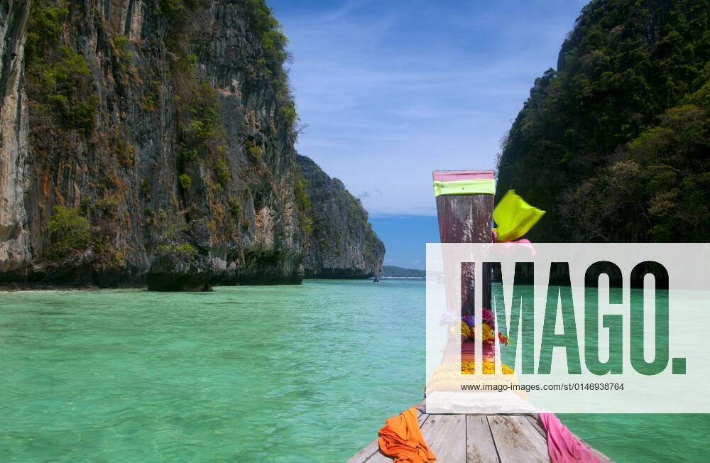 Ko Phi Phi consists of two islands, Phi Phi Leh and Phi Phi Don, located southeast of Phuket. Both are part of Hat Noppharat Thara Ko Phi Phi National Marine Park.<br ><br > Set in the centre of the Sea of Phuket, Ko Phi Phi is almost equidistant from Phuket and Krabi and can be reached by boat in around two hours.<br ><br > Phi Phi Don is the larger of the two islands, with scenic hills, steep cliffs, silken beaches, azure waters and remarkable bird- and sea-life. The island narrows at the middle where long, white-sand beaches are only a few hundred metres apart. Boats from Krabi and Phuket dock at Ao Ton Sai on the southern side of the island. Hat Yao or Long Beach faces south and is famous for the good snorkelling to be had on its co CPAxMediaxCo.xLtd. 1060_38_CPA0011088