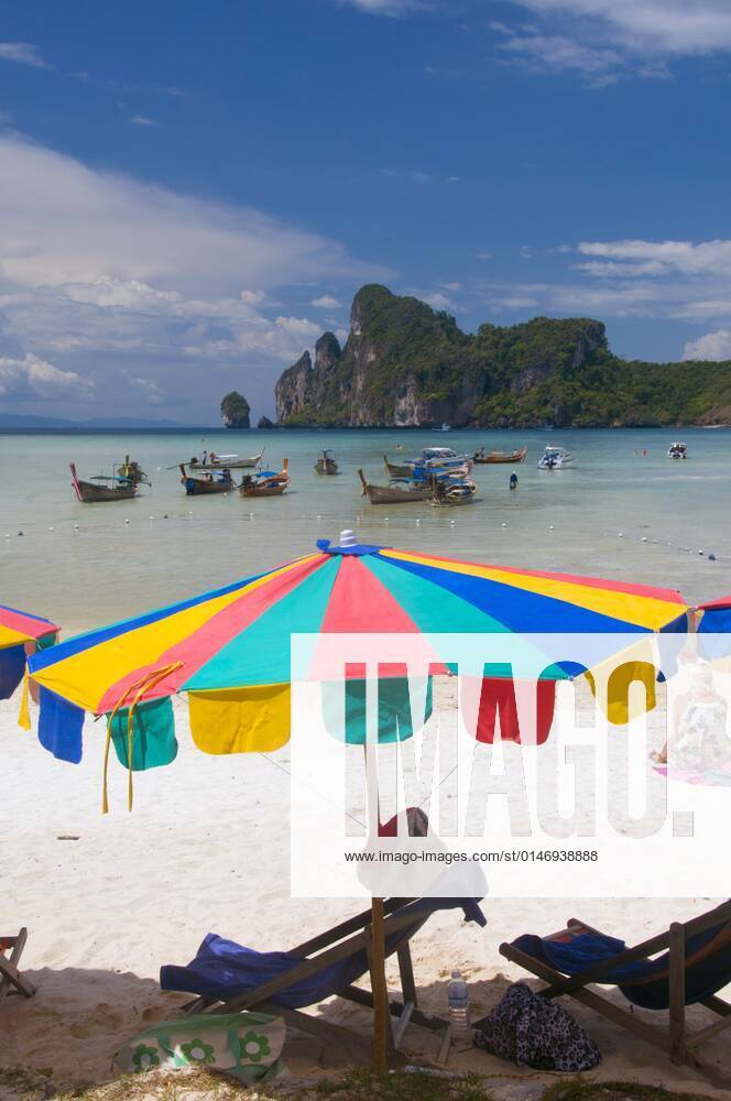 Ko Phi Phi consists of two islands, Phi Phi Leh and Phi Phi Don, located southeast of Phuket. Both are part of Hat Noppharat Thara Ko Phi Phi National Marine Park.<br ><br > Set in the centre of the Sea of Phuket, Ko Phi Phi is almost equidistant from Phuket and Krabi and can be reached by boat in around two hours.<br ><br > Phi Phi Don is the larger of the two islands, with scenic hills, steep cliffs, silken beaches, azure waters and remarkable bird- and sea-life. The island narrows at the middle where long, white-sand beaches are only a few hundred metres apart. Boats from Krabi and Phuket dock at Ao Ton Sai on the southern side of the island. Hat Yao or Long Beach faces south and is famous for the good snorkelling to be had on its co CPAxMediaxCo.xLtd. 1060_38_CPA0014896