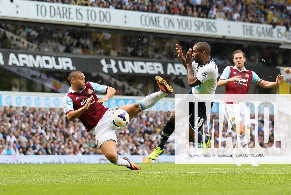 Tottenham s Jermain Defoe tussles with West Ham s Winston Reid Tottenham Hotspur - West Ham United - Premier League - White Hart Lane - London - England -06 10 2013 - Kleinx .
