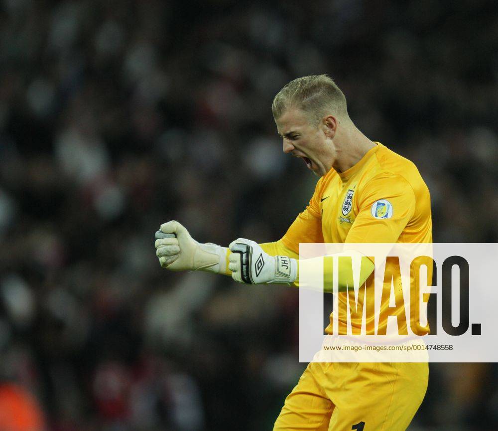 England v Montenegro - World Cup Qualifier . . Wembley, London, UK . . 11.10.2013 Joe Hart (E) celebrates the third England goal.