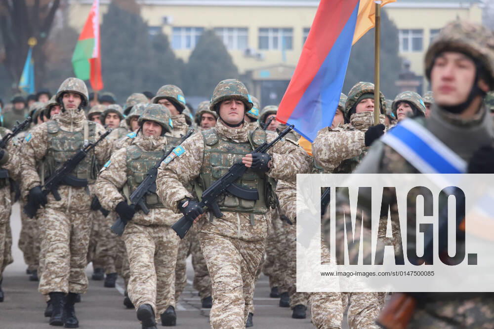 (220114) -- NUR-SULTAN, Jan. 14, 2022 -- The peacekeeping forces of the Collective Security Treaty Organization (CSTO) march on a departure ceremony in Almaty, Kazakhstan, Jan. 13, 2022. The peacekeeping forces of the CSTO have begun the handover of socially significant facilities to Kazakh law enforcement agencies, the Russian Defense Ministry said Thursday. According to the ministry, the peacekeeping units that have completed their assigned tasks started to prepare equipment for returning to their permanent deployment locations. (Photo by Xinhua) KAZAKHSTAN-CSTO-RETURN AlikhanxSariyev