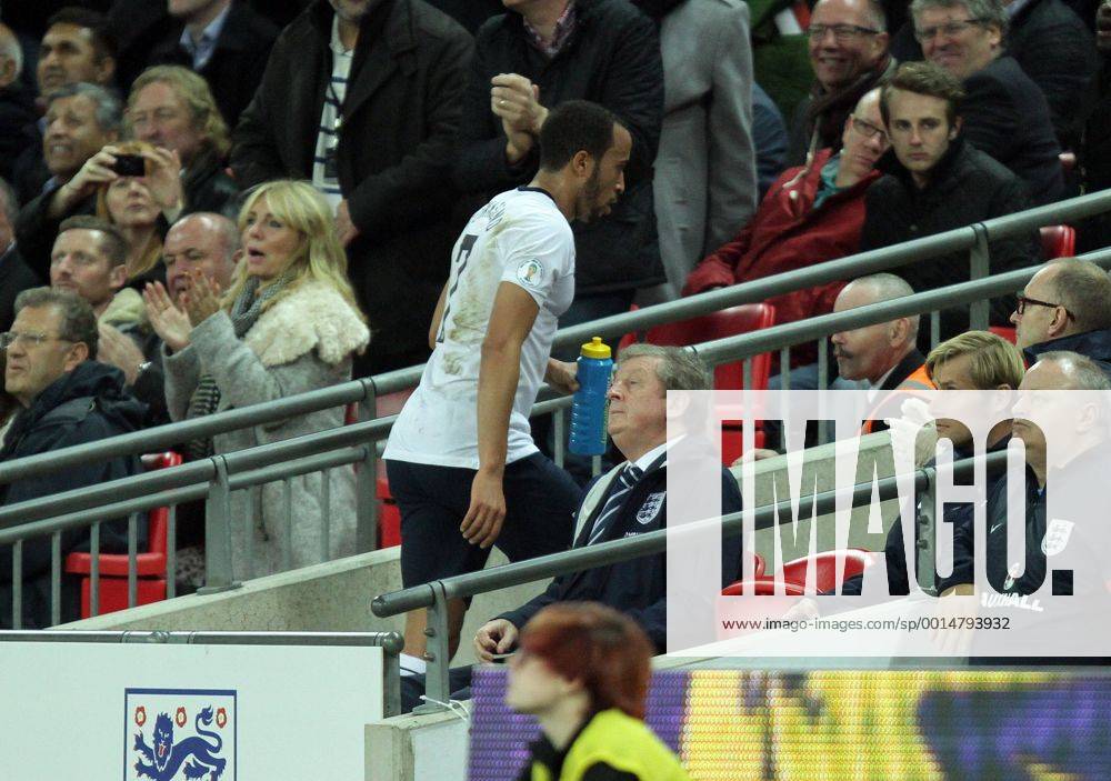 England v Poland - World Cup Qualifier . . Wembley, London, UK . . 15.10.2013 Andros Townsend (E) walks past Roy Hodgson (England manager) after being substituted in the second half.