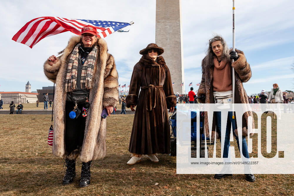 Defeat the Mandates rally and March Trump supporters in full length fur coats attend the Defeat the Mandates rally and march in Washington, DC. Organizers and attendees claim that vaccines and mask-wearing should be a personal choice, without regard to public health. The event was billed as a protest against vaccine and mask mandates used to stop the spread of the coronavirus by all Americans, but the crowd overwhelmingly leans right. 20,000 people are expected for the event. Washington DC United States