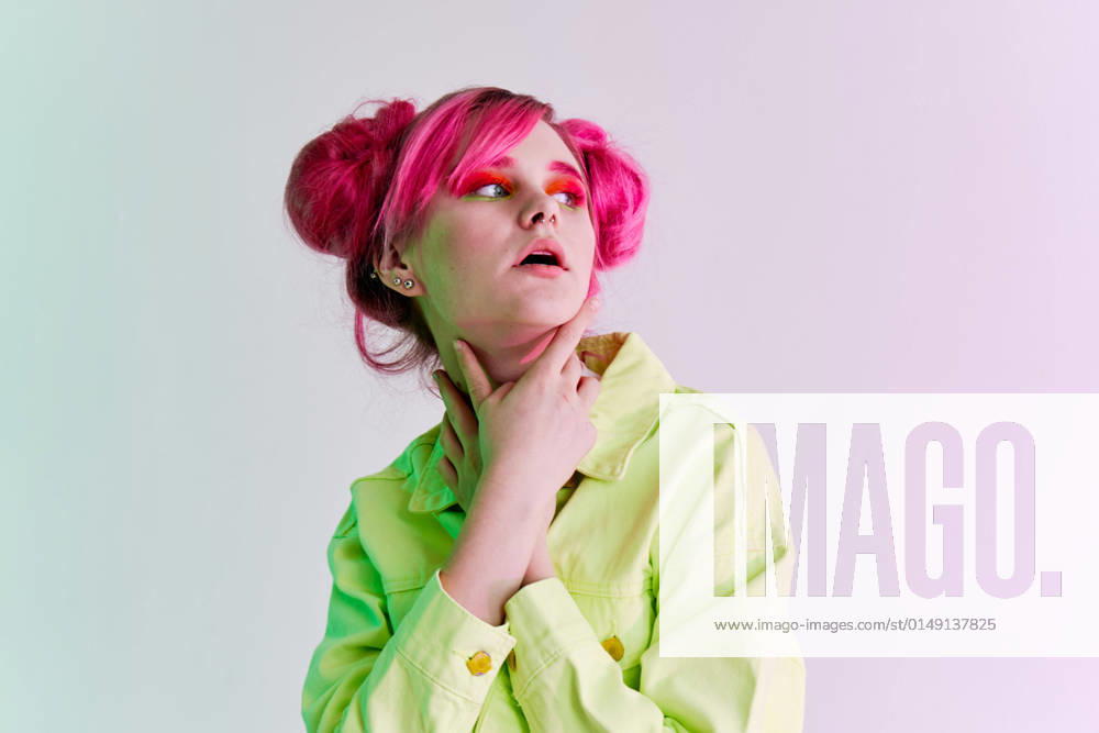 IMAGO Creative, Lifestyle, Barbiecore hipster woman bright cosmetics party posing studio model hipster woman bright cosmetics party posing studio model. High quality photo