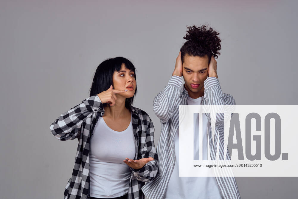 Young couple modern clothes posing fun friendship young couple modern clothes posing fun friendship. High quality photo