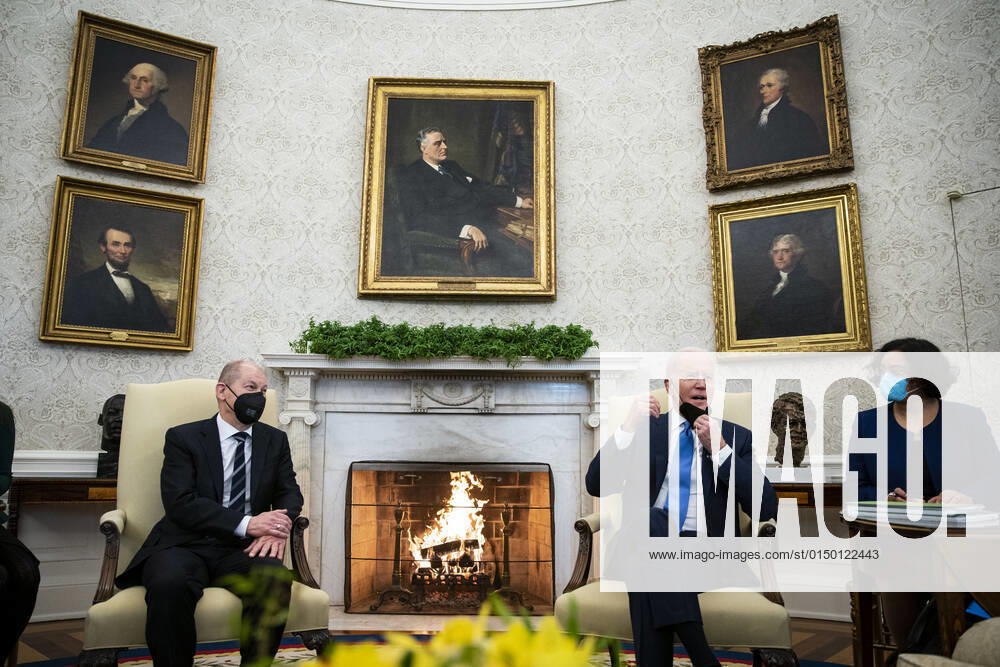 United States President Joe Biden, right, meets with Chancellor Olaf Scholz of Germany, left, in the Oval Office of the White House in Washington, DC, on Monday, February 7, 2022 Washington USA - ZUMAs152 20220207_zaa_s152_001