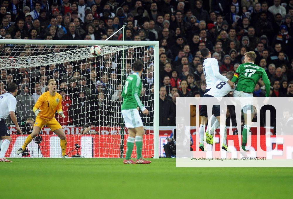 Football - 2013 International Friendly - England vs. Germany Per Mertesacker - Germany (17) heads his goal past Joe hart at Wembley. COLORSPORT ANDREW COWIE