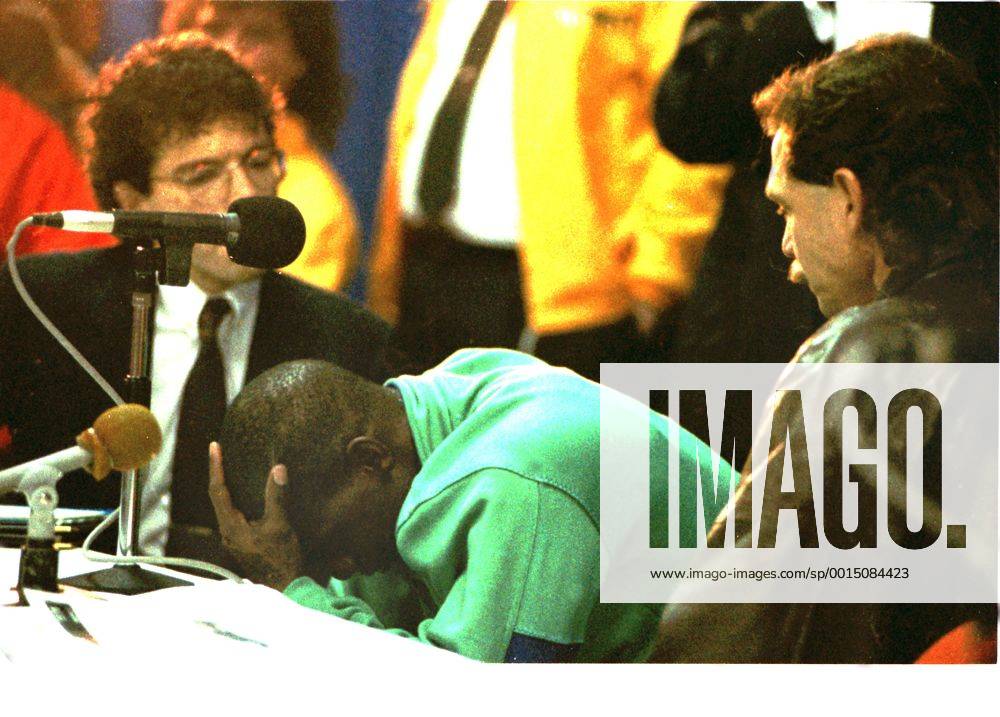 Athletics - 1991 Hamilton Spectator Indoor Games - Ben Johnson Comeback Race Ben Johnson during a press conference after making his return to the track after serving his drugs suspension after failing the test after the Seoul Olympic 100m final. His coach Loren Seagrave is right. At the Copps Coliseum Johnson was greeted by the largest crowd to ever attend an indoor Canadian track and field event. More than 17,000 saw him finish second in the 50 metres in 5.77 seconds. 11 01 1991